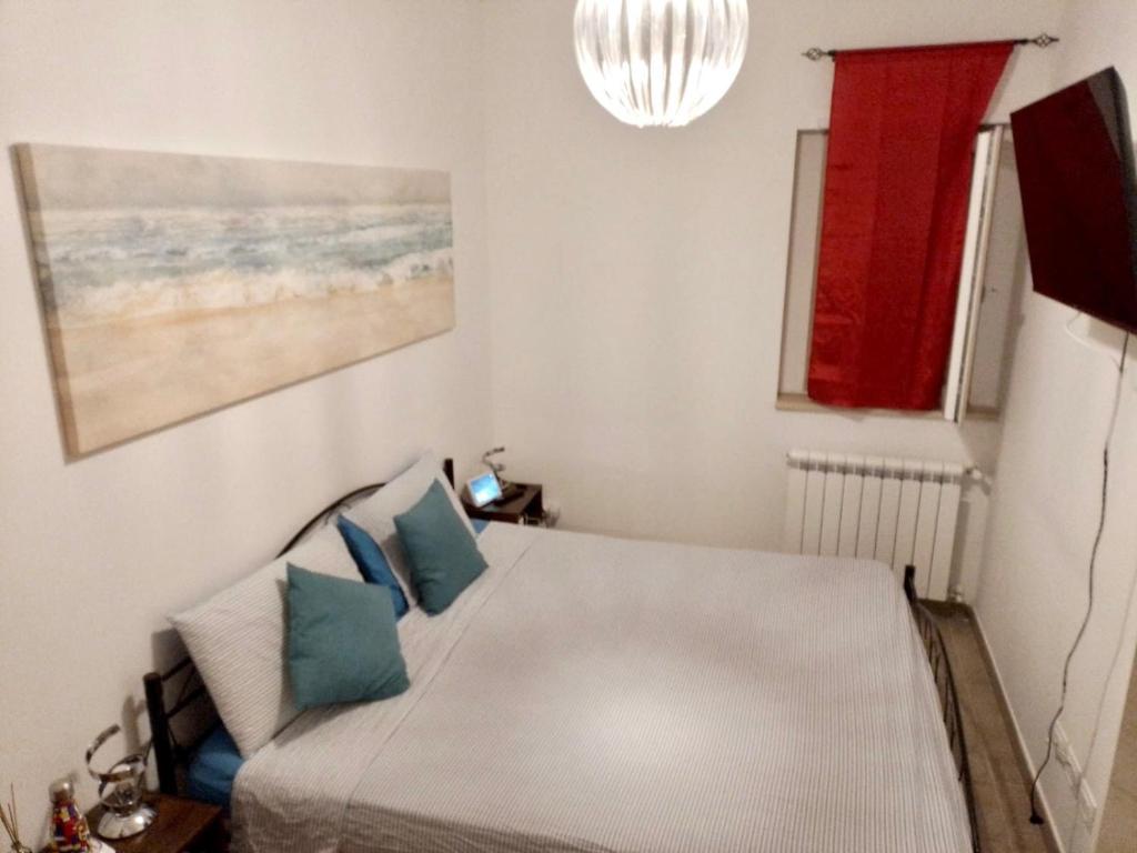Posteľ alebo postele v izbe v ubytovaní Tiny Green apartament in Rome - Magliana