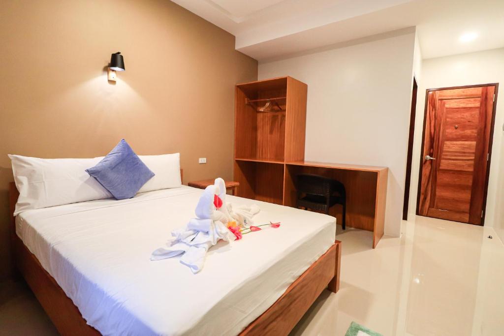 Postel nebo postele na pokoji v ubytování Josefina's Tourist Inn
