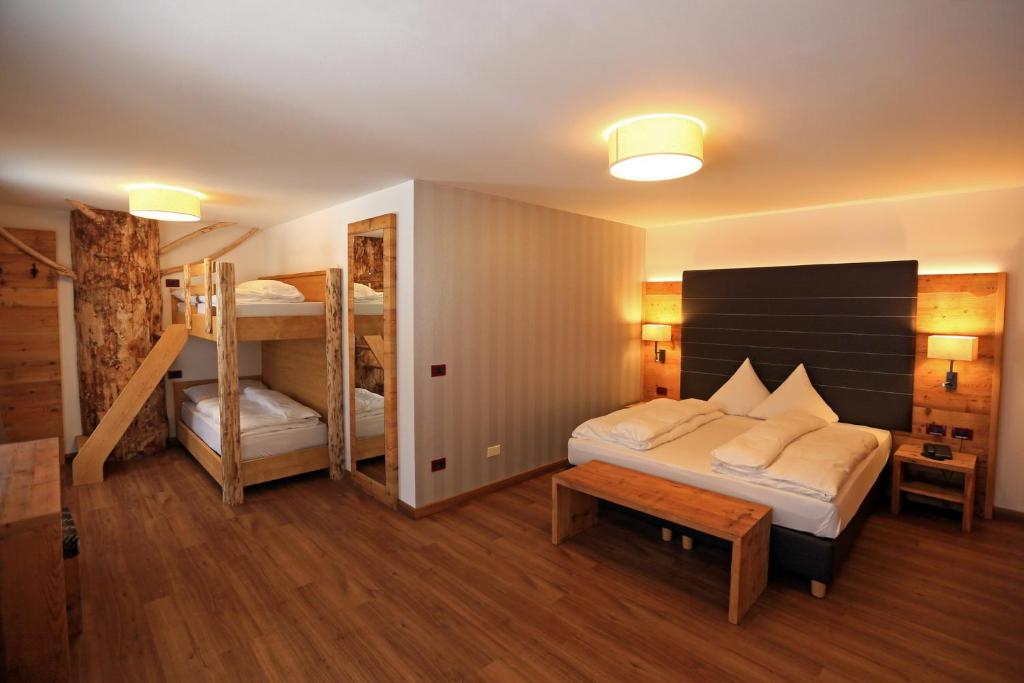 Posteľ alebo postele v izbe v ubytovaní Hotel Astoria