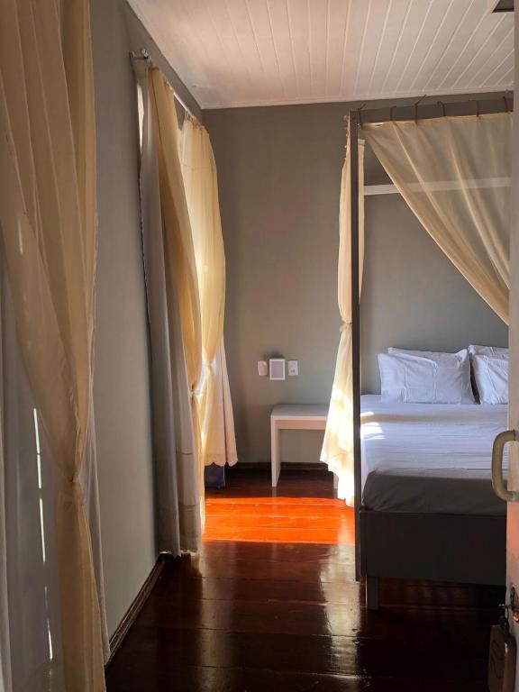 Postel nebo postele na pokoji v ubytování Pousada Portas da Amazônia