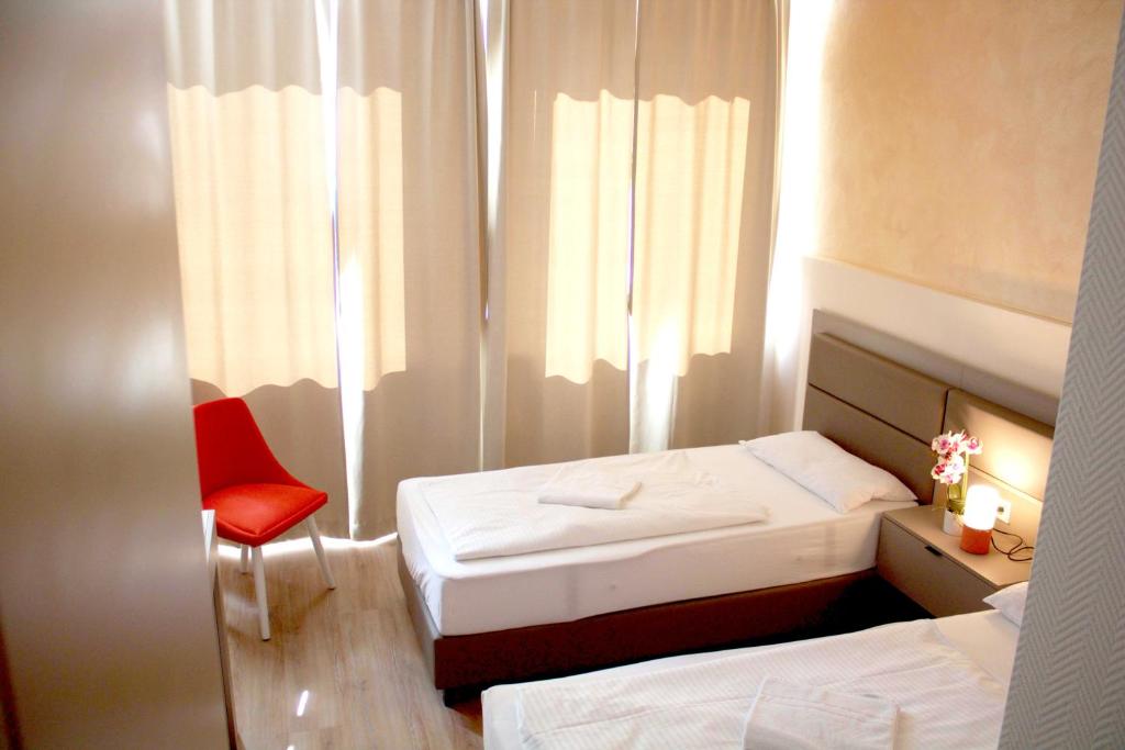 Postel nebo postele na pokoji v ubytování Isar City Hotel