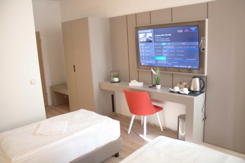 Postel nebo postele na pokoji v ubytování Isar City Hotel