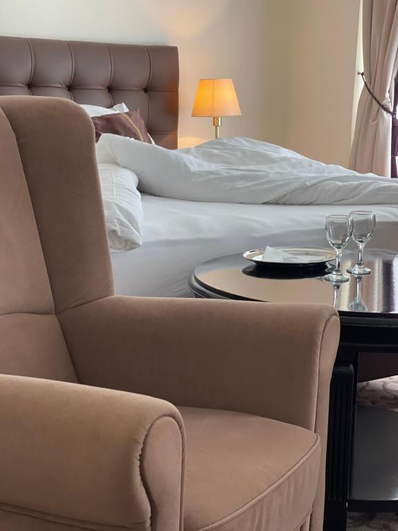 Postel nebo postele na pokoji v ubytování WINDSOR SPA Hotel