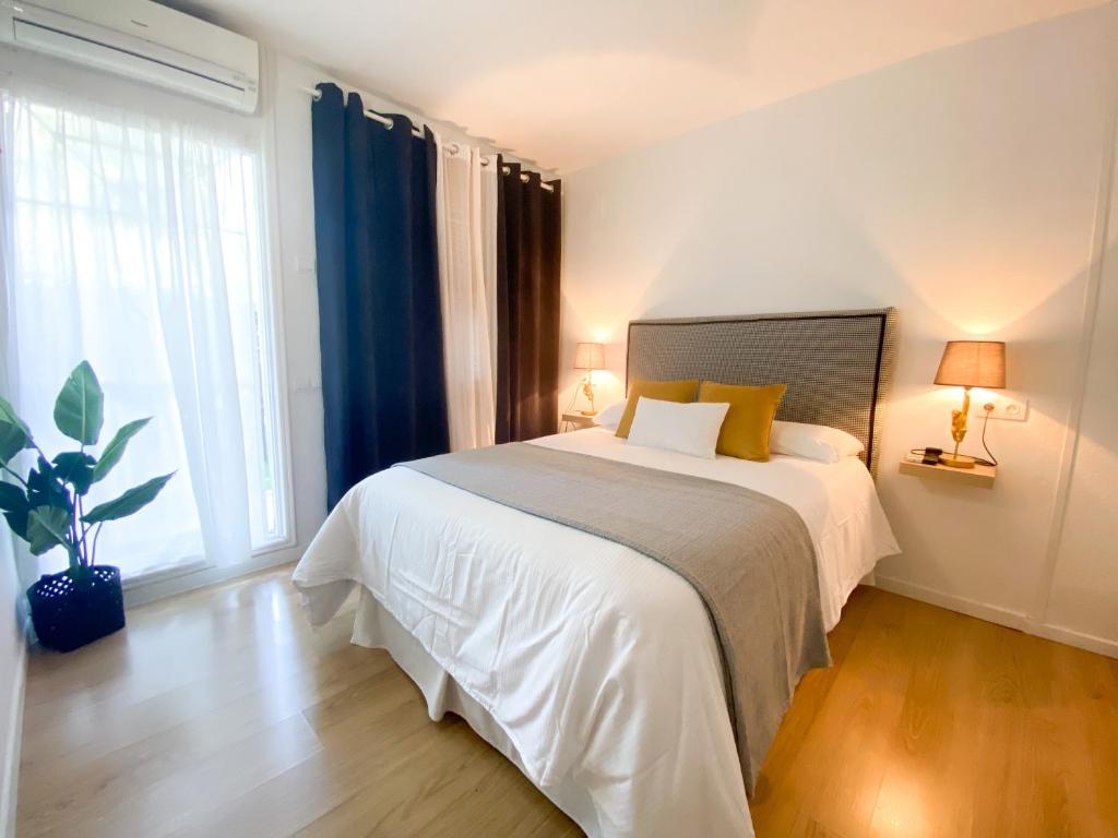 Katil atau katil-katil dalam bilik di Apartamento Brisas