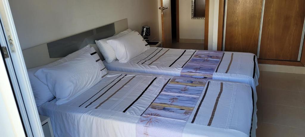 Łóżko lub łóżka w pokoju w obiekcie Pueblo Dorado, Mojacar