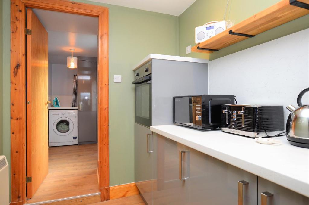 Kuchyň nebo kuchyňský kout v ubytování Chapelton Cottage