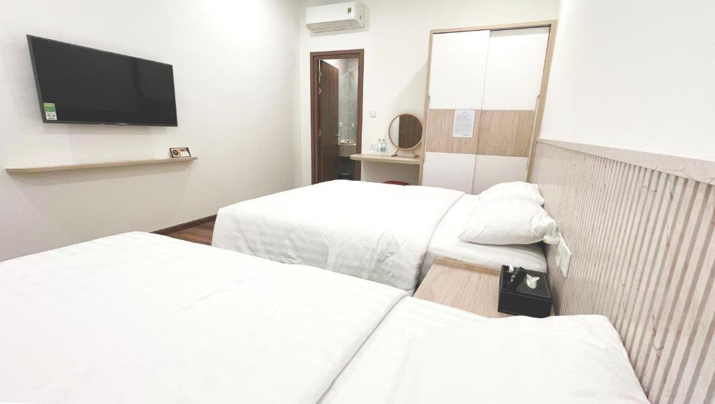 Cama o camas de una habitación en HERA HOSTEL