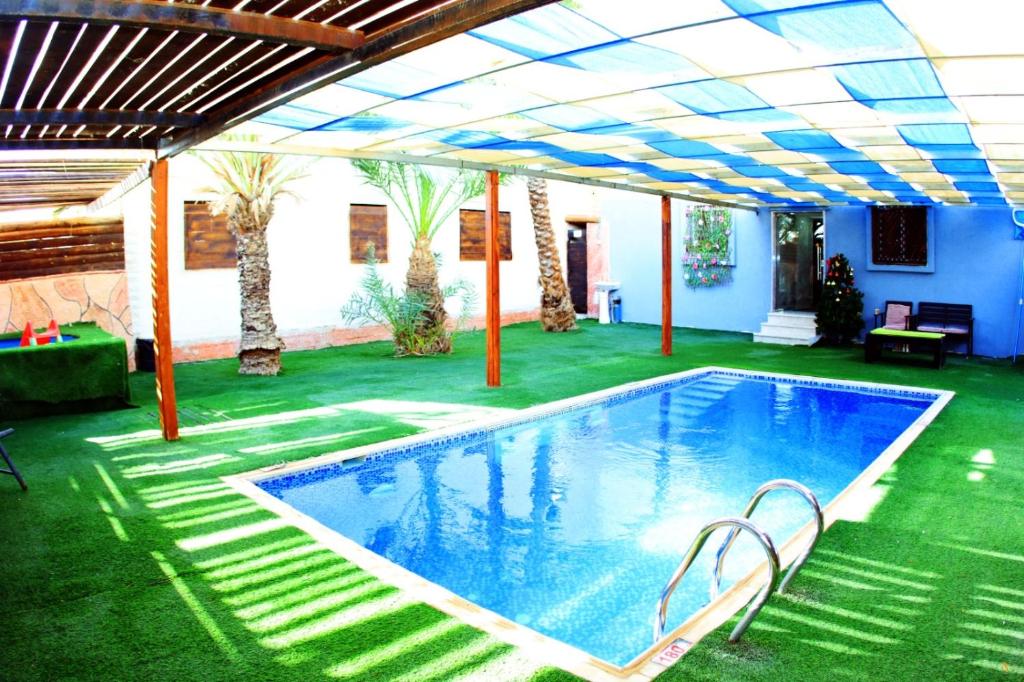 Bazén v ubytování Magtas Hotel nebo v jeho okolí
