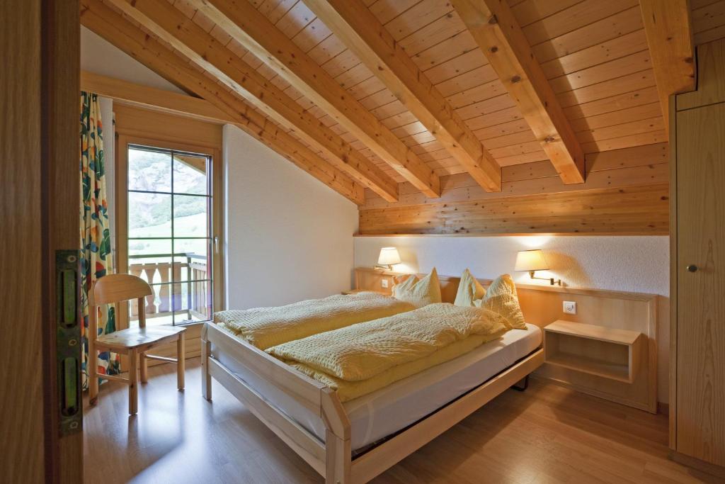 Postel nebo postele na pokoji v ubytování Les Naturelles