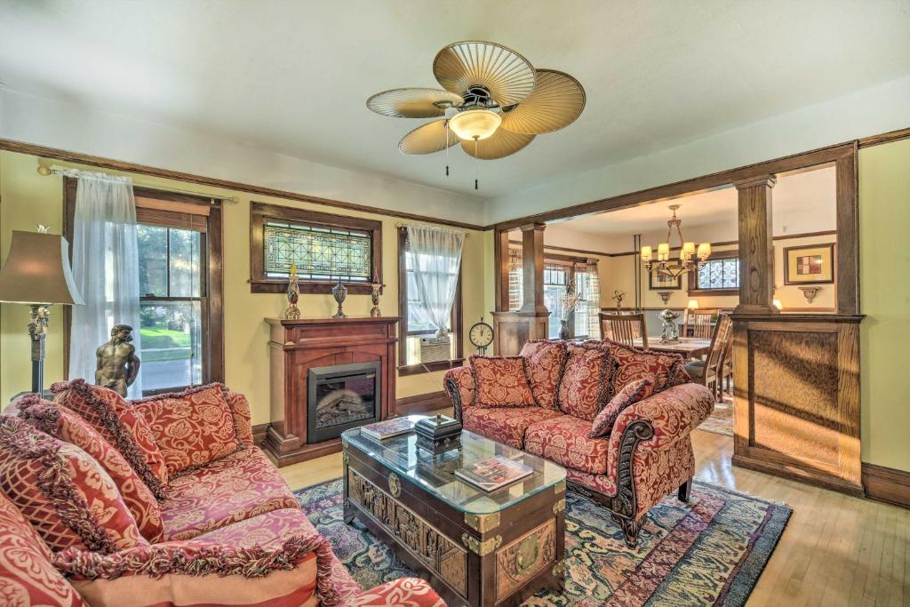 a living room with two couches and a fireplace at Elegant Superior Getaway Less Than 2 Mi to Downtown! in Superior