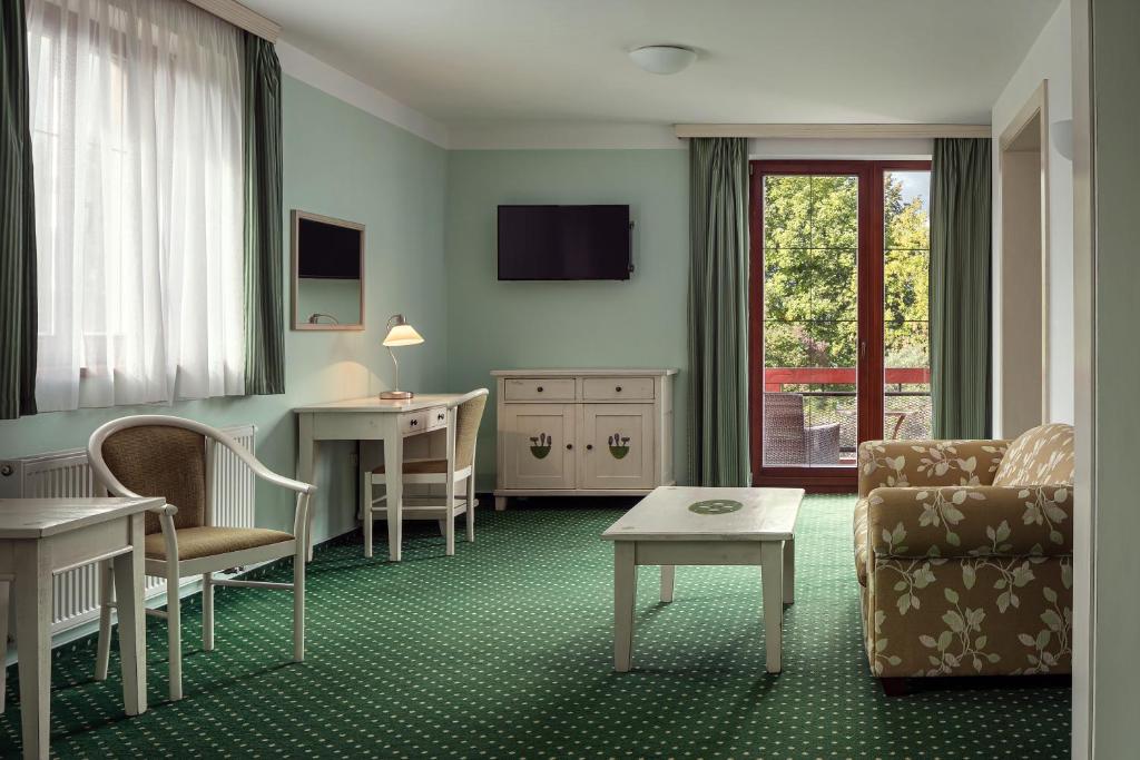 Posezení v ubytování Golf & Spa Kunětická Hora