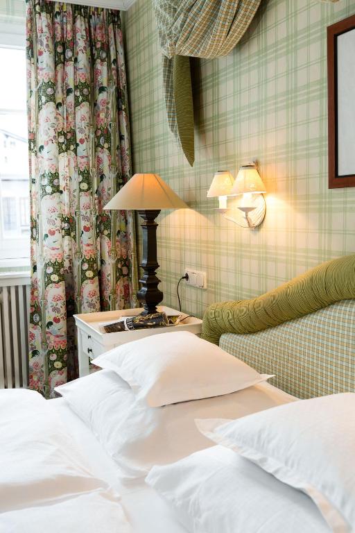 Postel nebo postele na pokoji v ubytování Hotel Edelweiss
