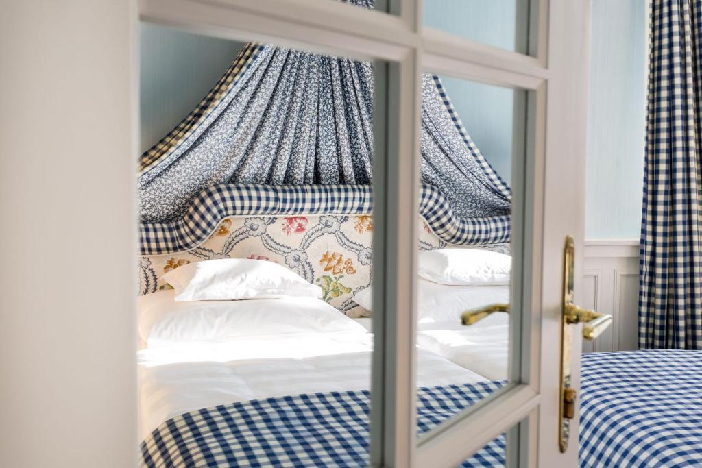 Postel nebo postele na pokoji v ubytování Hotel Edelweiss
