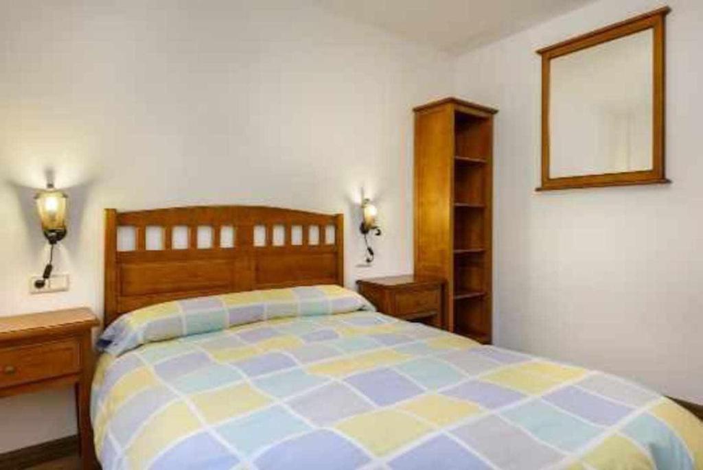Postel nebo postele na pokoji v ubytování edificio CAPERAN 2hab o hab familiar WOWRURAL