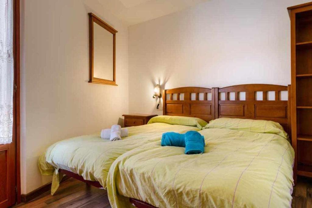 Postel nebo postele na pokoji v ubytování edificio CAPERAN 2hab o hab familiar WOWRURAL