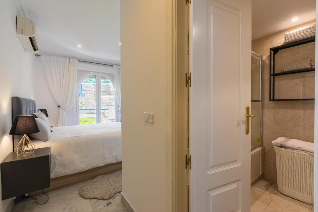 Posteľ alebo postele v izbe v ubytovaní Great views, large terrace & walking distance