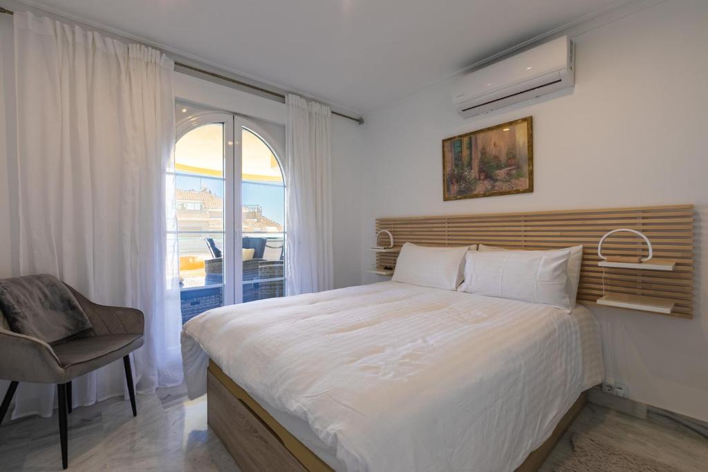 Posteľ alebo postele v izbe v ubytovaní Great views, large terrace & walking distance