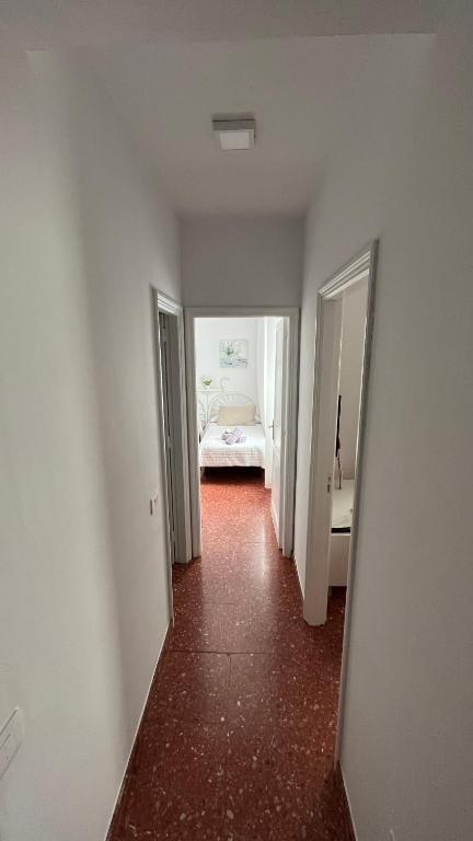 Posteľ alebo postele v izbe v ubytovaní Vivienda Vacacional Tienda Loly