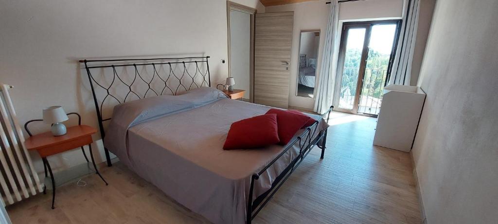 Postel nebo postele na pokoji v ubytování Terrazza Arcius