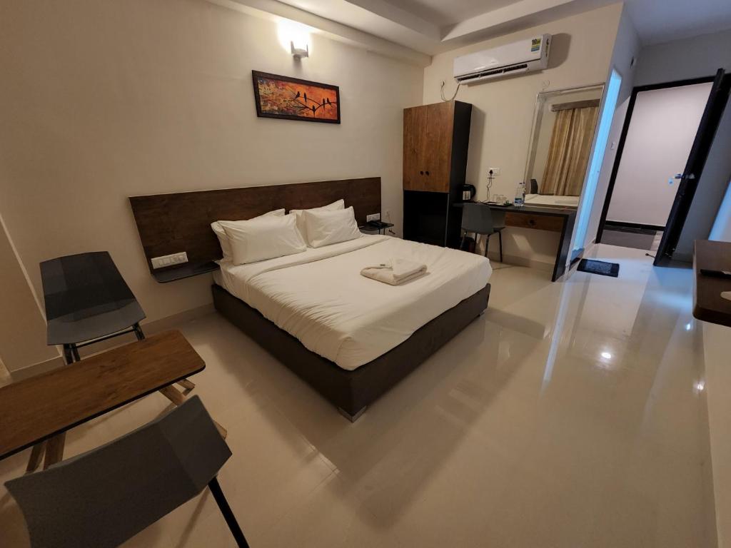 Postel nebo postele na pokoji v ubytování HOTEL PARK RAAMA