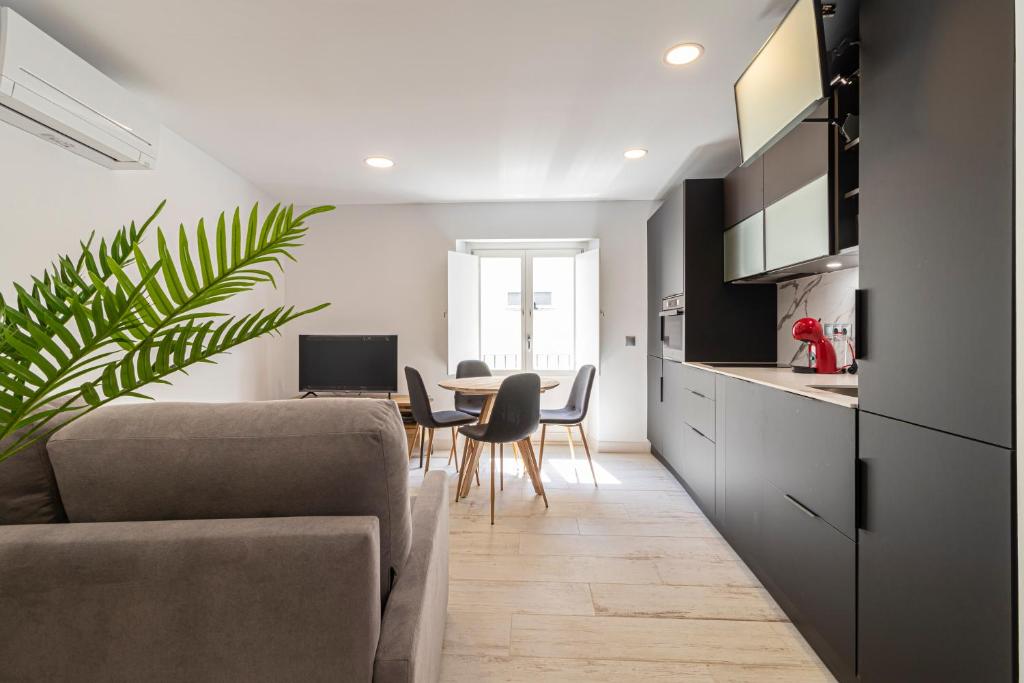 TV a/nebo společenská místnost v ubytování Allo Apartments San Roque 3ºB