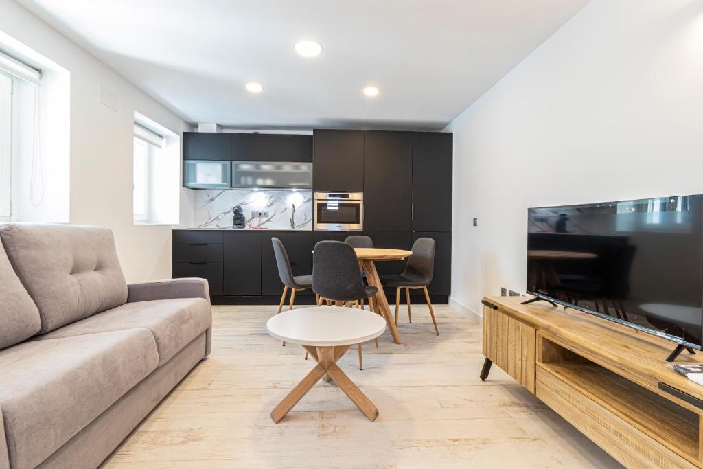 TV a/nebo společenská místnost v ubytování Allo Apartments San Roque 3ºC
