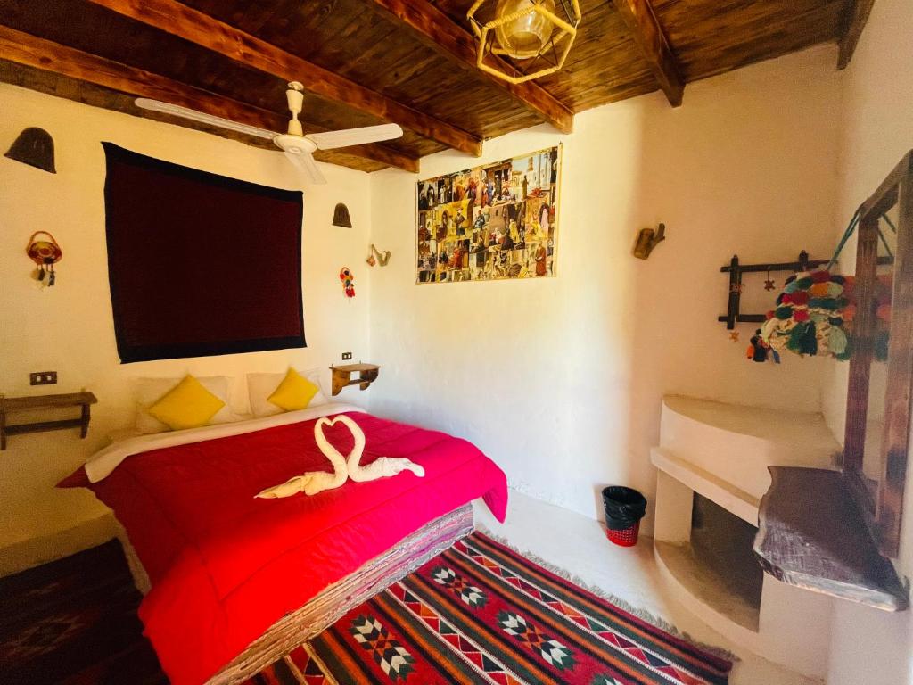 Postel nebo postele na pokoji v ubytování Moon_Valley_Siwa