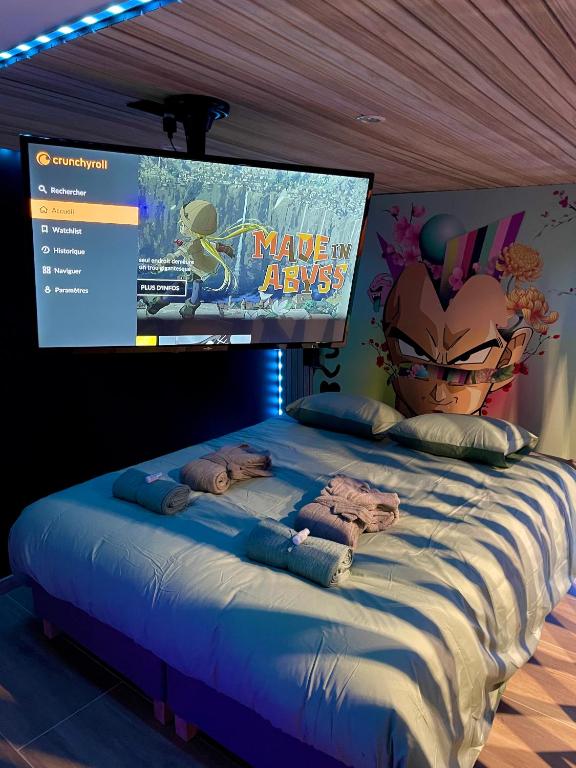 Posteľ alebo postele v izbe v ubytovaní Capsule Manga - Jacuzzi - Billard - Nintendo Switch - Netflix