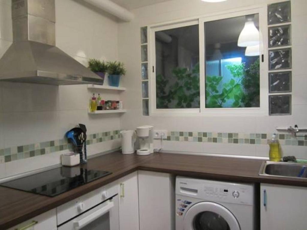 Kuchyň nebo kuchyňský kout v ubytování Apartment Barca 1 Camp Nou