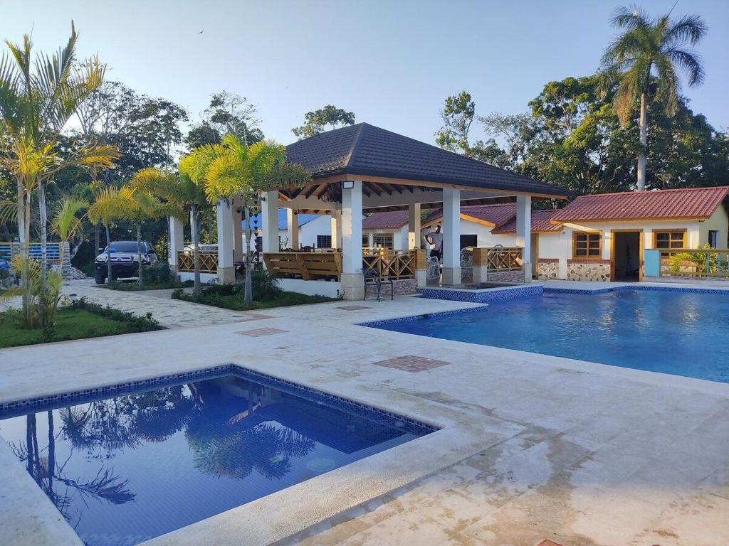 Bazén v ubytování Villa Yamilet By Hospedify - Hermosa villa con Piscina, mesa de Billa y cancha de baloncesto nebo v jeho okolí