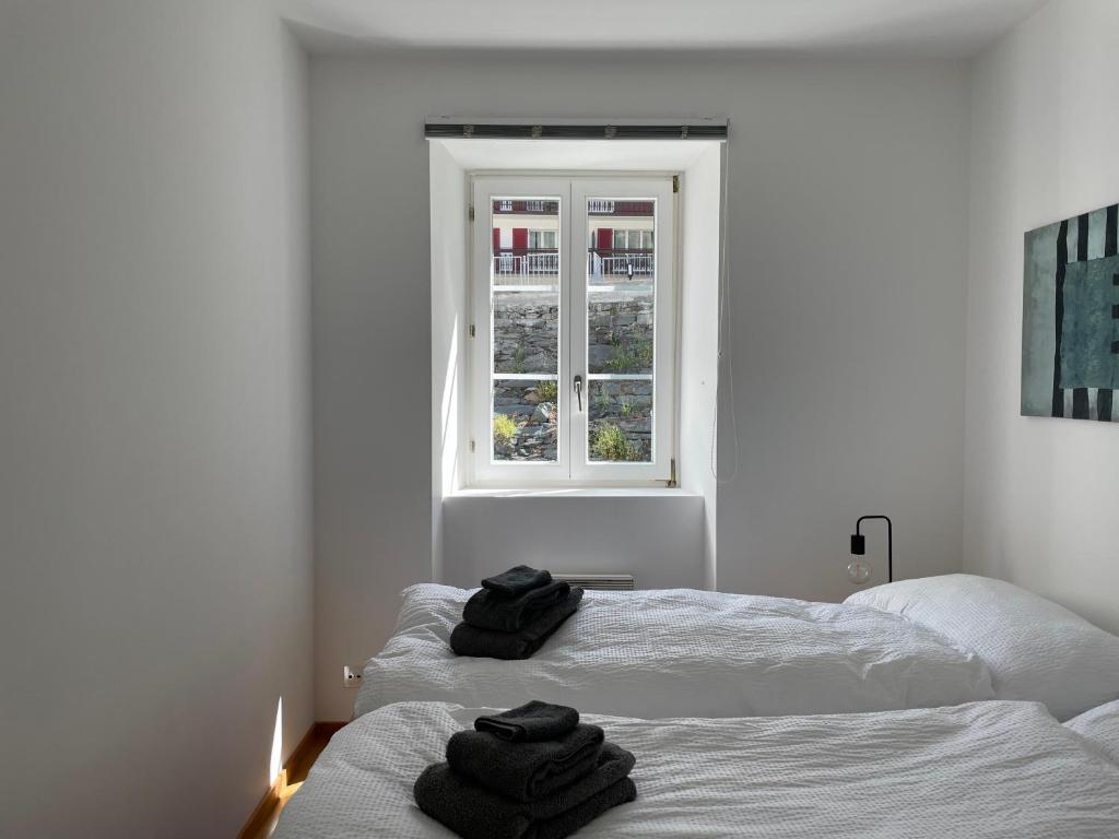 Postel nebo postele na pokoji v ubytování Terra - Haus auf dem Sand