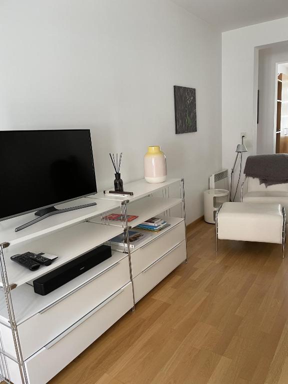 TV a/nebo společenská místnost v ubytování Terra - Haus auf dem Sand