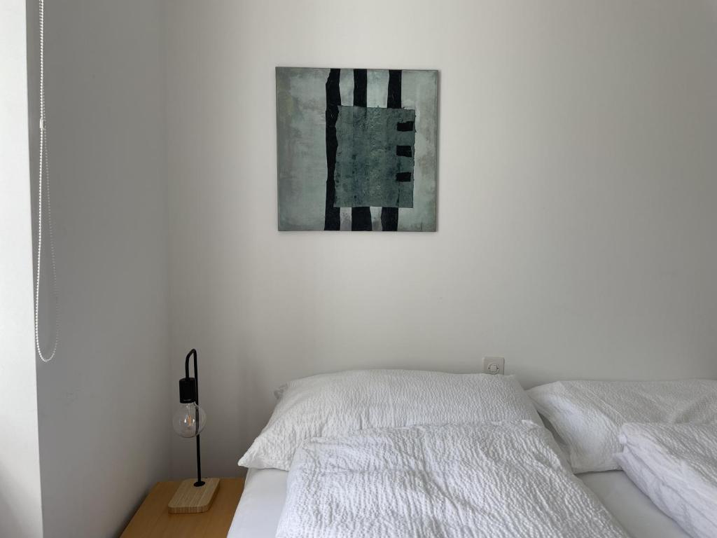 Postel nebo postele na pokoji v ubytování Terra - Haus auf dem Sand