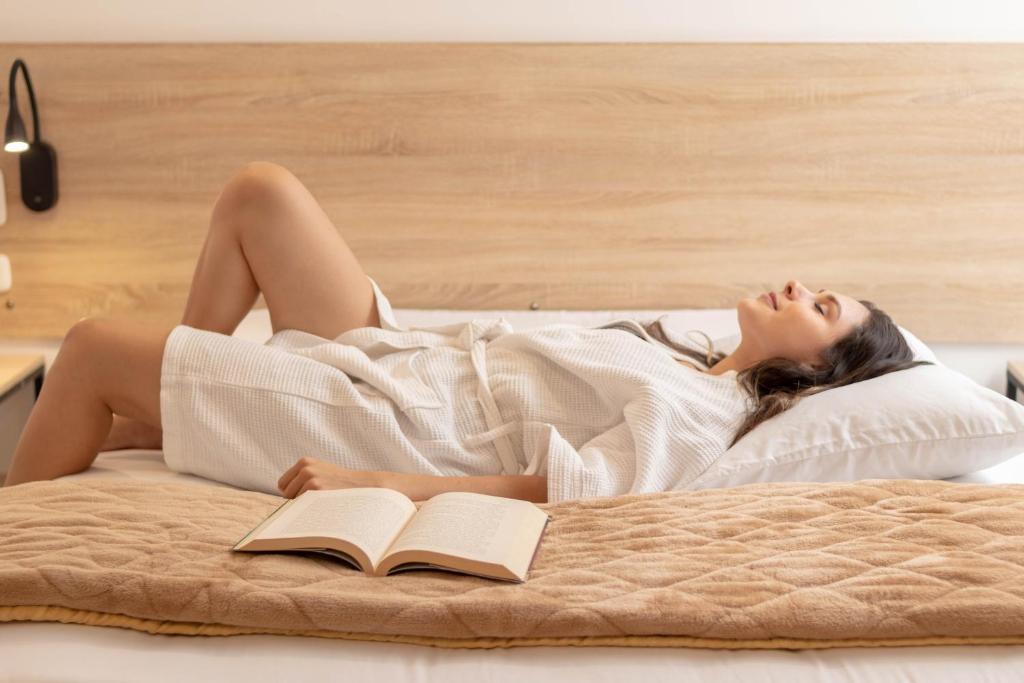 Postel nebo postele na pokoji v ubytování Bianco Hotel Boutique