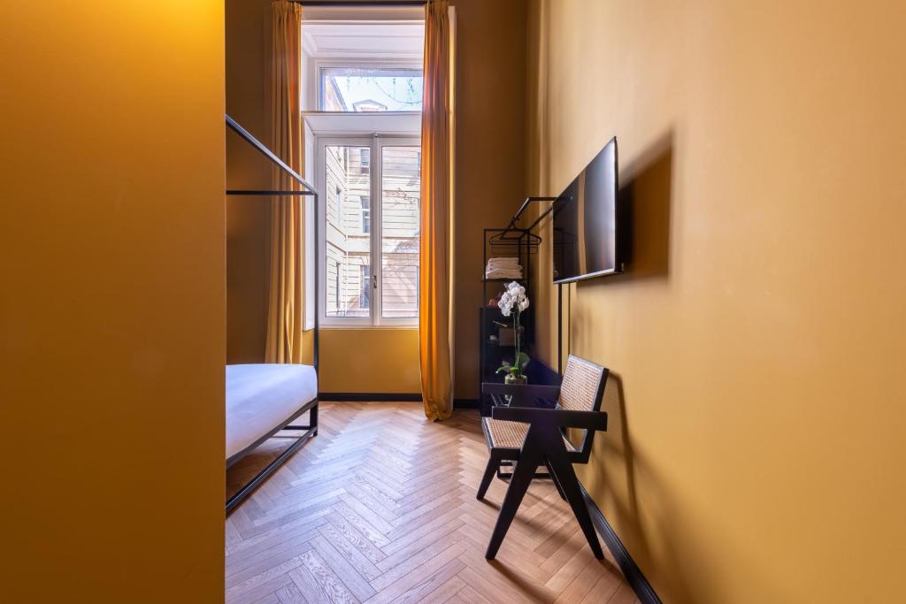 Televízia a/alebo spoločenská miestnosť v ubytovaní The Couper Castello
