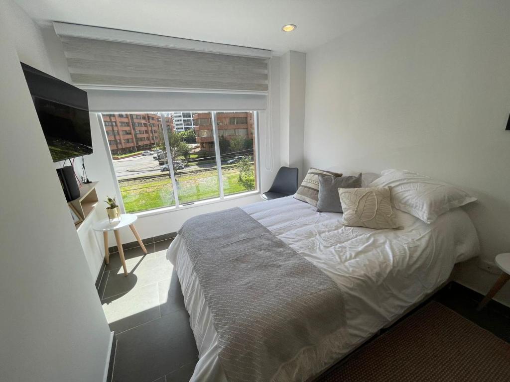 Cama o camas de una habitación en Apartamento Independiente ubicado en santa barbara 203