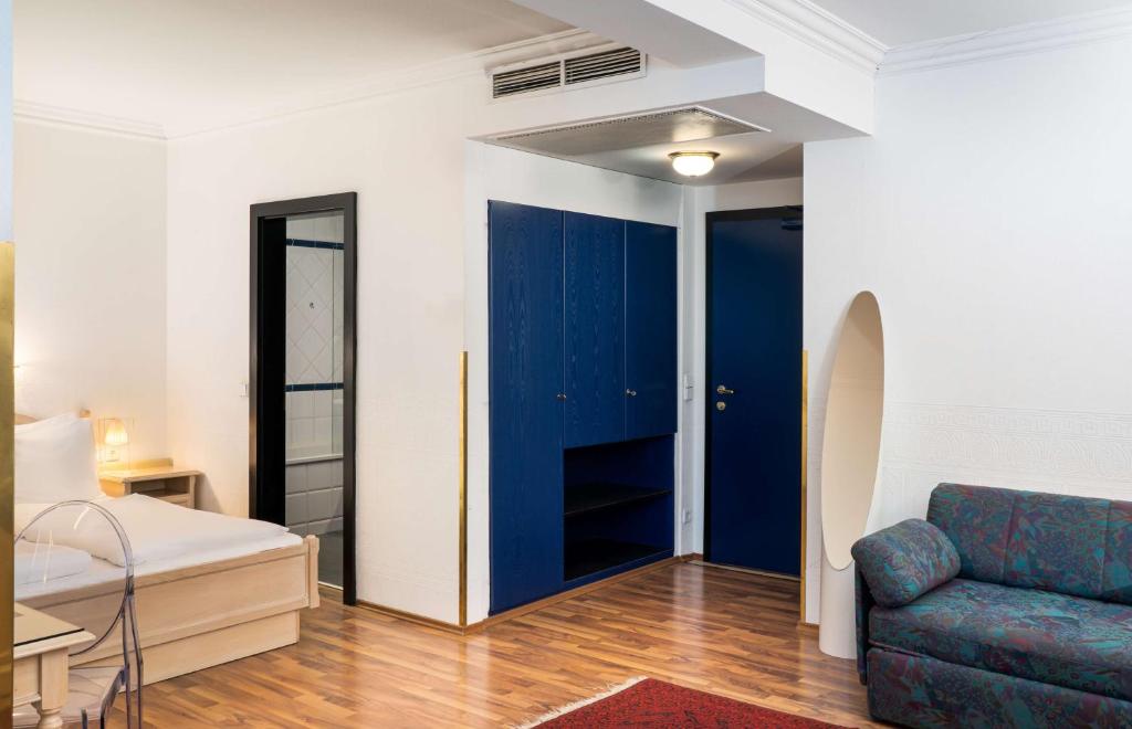 Postel nebo postele na pokoji v ubytování Arthotel ANA Gala