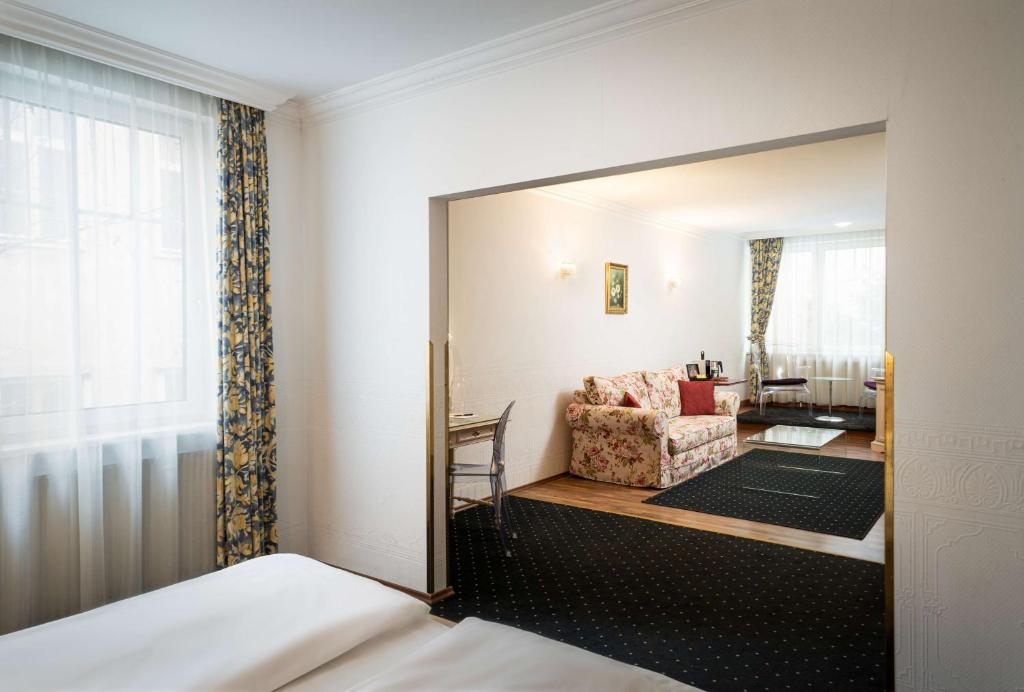 Postel nebo postele na pokoji v ubytování Arthotel ANA Gala