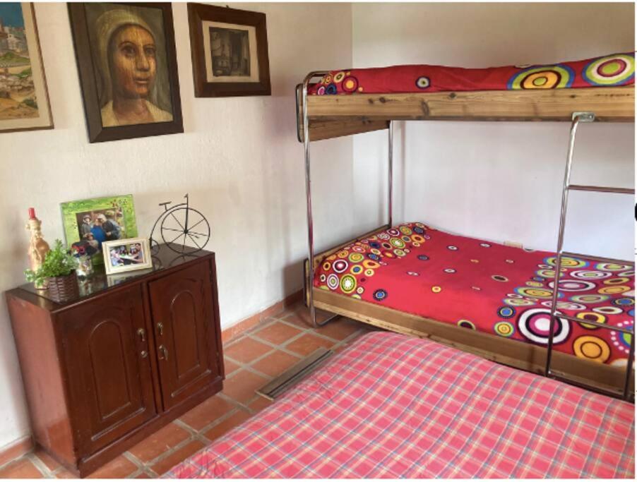 Voodi või voodid majutusasutuse Mirador de los Vientos toas