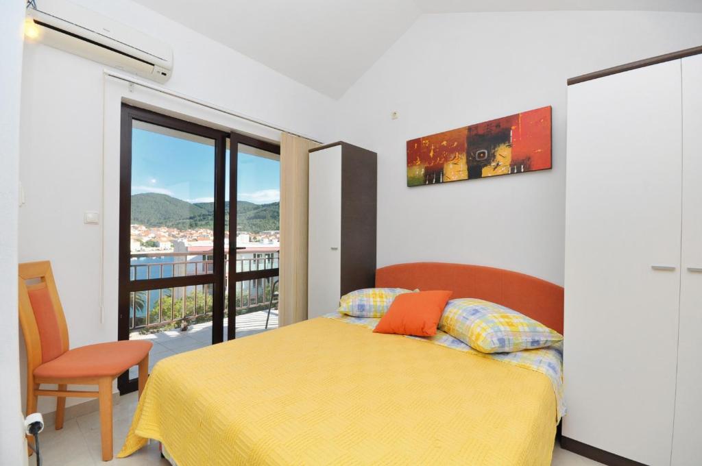 Postel nebo postele na pokoji v ubytování Apartments by the sea Vela Luka, Korcula - 9243