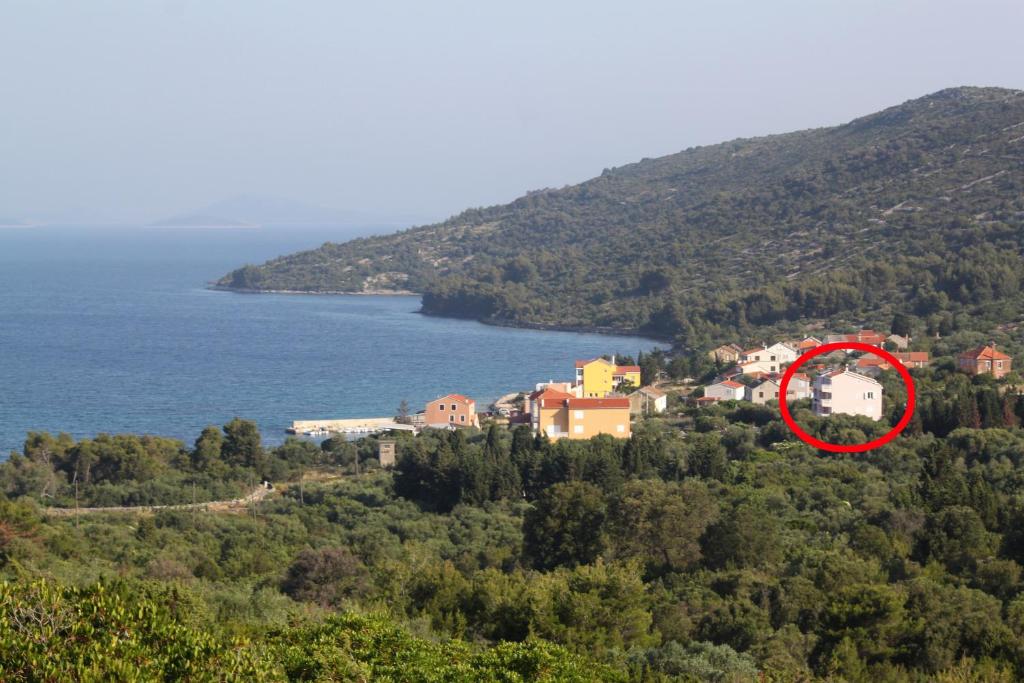 Et luftfoto af Apartments and rooms by the sea Cove Soline, Dugi otok - 448