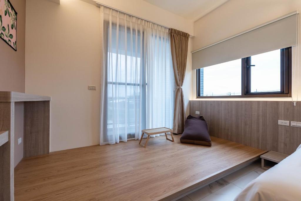 Postel nebo postele na pokoji v ubytování FUN Style Homestay