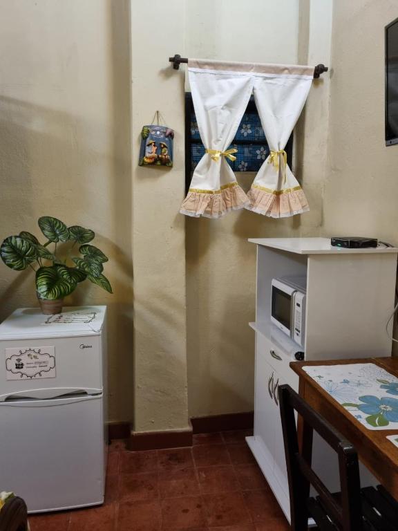 Kuchyň nebo kuchyňský kout v ubytování Hostal Mi lugar Vintage