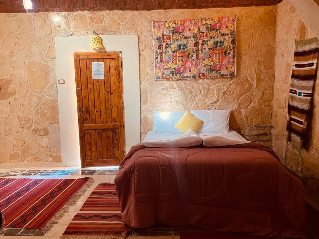Postel nebo postele na pokoji v ubytování Moon_Valley_Siwa