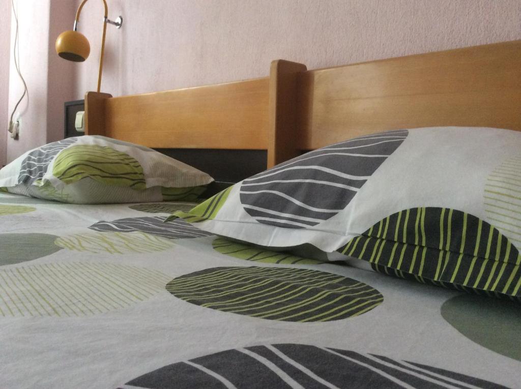 Postel nebo postele na pokoji v ubytování Hotel Balevurov