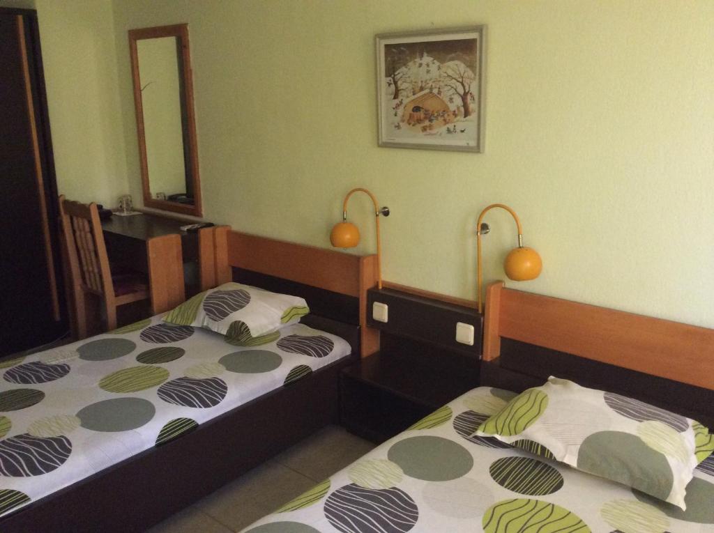Postel nebo postele na pokoji v ubytování Hotel Balevurov