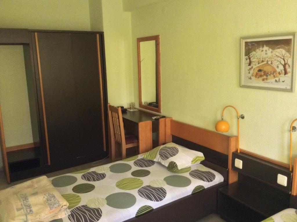Postel nebo postele na pokoji v ubytování Hotel Balevurov