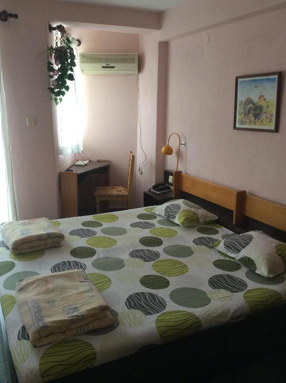Postel nebo postele na pokoji v ubytování Hotel Balevurov