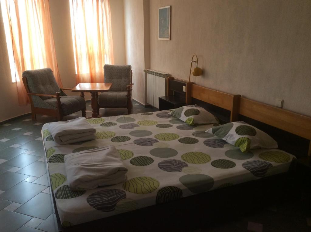 Postel nebo postele na pokoji v ubytování Hotel Balevurov