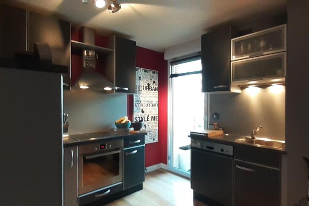 Kuchyňa alebo kuchynka v ubytovaní Appt centre ville "Parc Olympe de Gouges" avec garage
